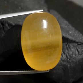 Calcita laranja natural 40,17ct, corte oval, translúcido
