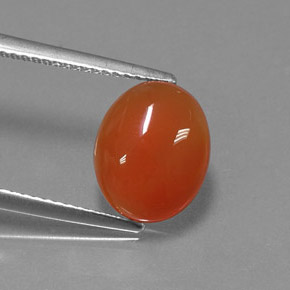 Cornalina laranja natural 3,02ct, corte oval, translúcido
