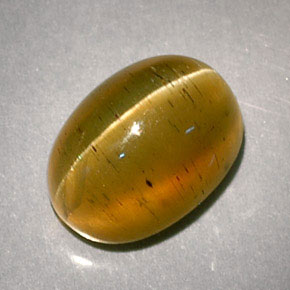 Cat's eye apatite amarelo natural 3,32ct, corte oval, translúcido