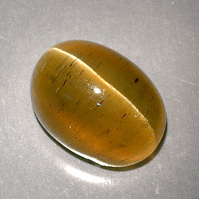 Cat's eye apatite amarelo natural 3,32ct, corte oval, translúcido