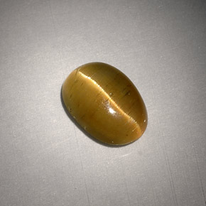 Cat's eye apatite amarelo natural 3,01ct, corte oval, translúcido