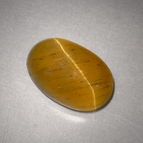 Cat's eye apatite amarelo natural 2,48ct, corte oval, translúcido