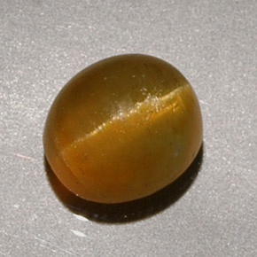 Cat's eye apatite amarelo natural 1,90ct, corte oval, translúcido