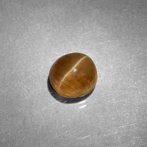 Cat's eye apatite amarelo natural 1,61ct, corte oval, translúcido