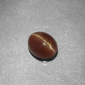 Cat's eye apatite amarelo natural 1,47ct, corte oval, translúcido