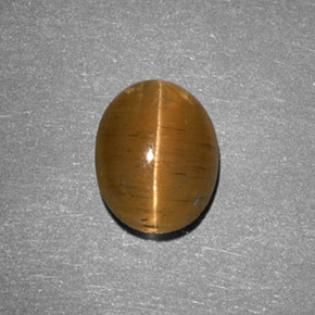 Cat's eye apatite amarelo natural 2,05ct, corte oval, translúcido