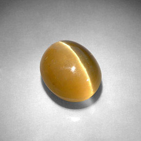 Apatita Olho de Gato Dourado Esverdeado Natural 5.72ct, Corte Oval, Translúcido