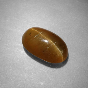 Cat's eye apatite amarelo natural 2,44ct, corte oval, translúcido