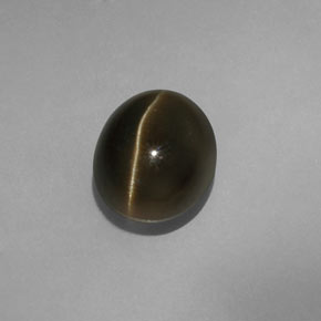 Cat's eye apatite verde natural 5,70ct, corte oval, translúcido