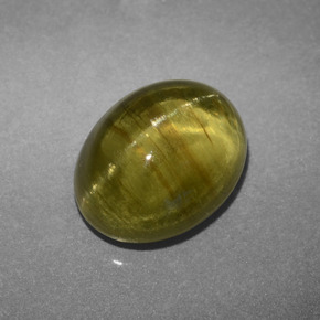 Apatita olho de gato verde dourado natural 3,66ct, corte oval, translúcido
