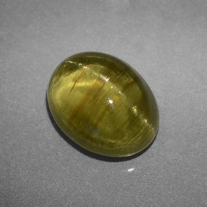 Apatita olho de gato verde dourado natural 3,66ct, corte oval, translúcido
