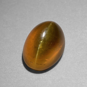 Apatita Olho de Gato Dourado Esverdeado Natural 6.55ct, Corte Oval, Translúcido