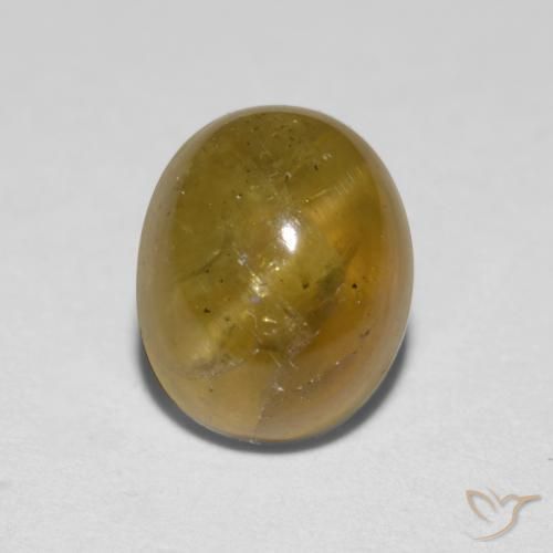 1.76ct Natural Amarelo acastanhado Apatita Olho de Gato, oval, Translúcido