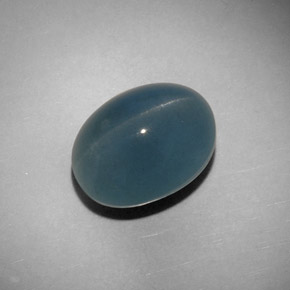 Cat's eye aquamarine verde natural 11,25ct, corte oval, translúcido