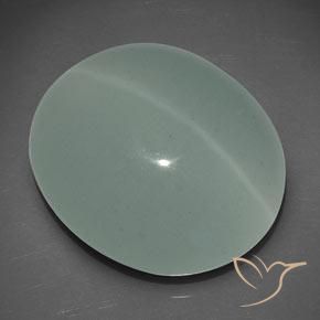 Cat's eye aquamarine verde natural 25,56ct, corte oval, translúcido