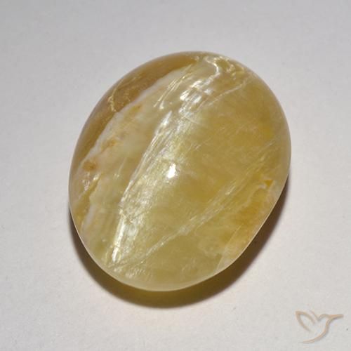 6.21ct Natural amarelo médio Opala Olho de Gato, oval, Translúcido