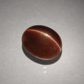 Cat's eye scapolite marrom natural 2,56ct, corte oval, opaco