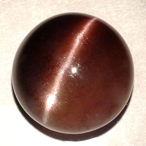 Cat's eye scapolite marrom natural 11,06ct, corte redondo, translúcido