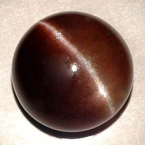 Cat's eye scapolite marrom natural 11,06ct, corte redondo, translúcido