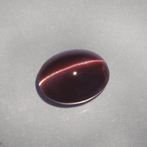 Escapolita Olho de Gato Marrom escuro Natural 4.26ct, Corte Oval, Translúcido