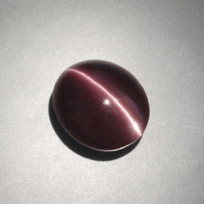 Cat's eye scapolite marrom natural 4,00ct, corte oval, opaco