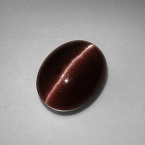 Cat's eye scapolite marrom natural 3,41ct, corte oval, opaco