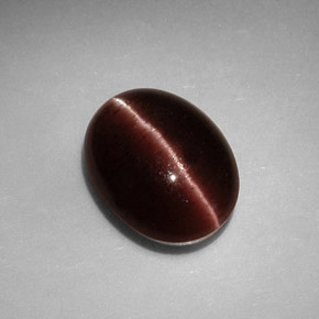Cat's eye scapolite marrom natural 3,41ct, corte oval, opaco