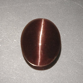 Cat's eye scapolite marrom natural 2,32ct, corte oval, opaco