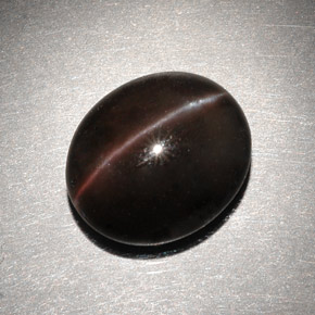 Cat's eye scapolite marrom natural 6,82ct, corte oval, translúcido