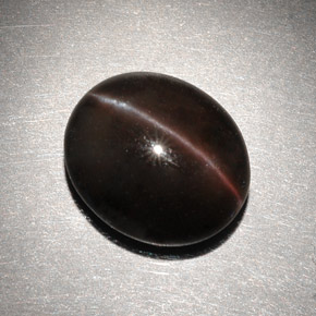 Cat's eye scapolite marrom natural 6,82ct, corte oval, translúcido