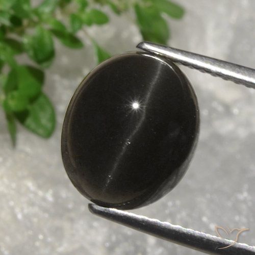 5.07ct Natural Marrom escuro Escapolita Olho de Gato, oval, Translúcido