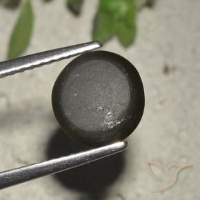 Cat's eye scapolite preto natural 2,72ct, corte redondo, translúcido