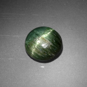 Cat's eye tourmaline verde natural 0,87ct, corte redondo, opaco