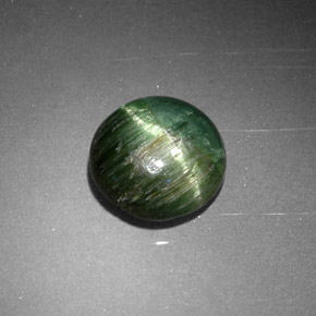 Cat's eye tourmaline verde natural 0,87ct, corte redondo, opaco