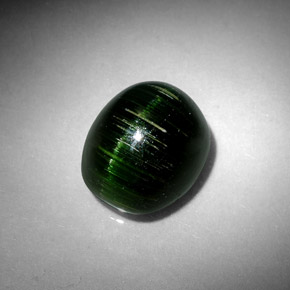Cat's eye tourmaline verde natural 4,67ct, corte oval, opaco