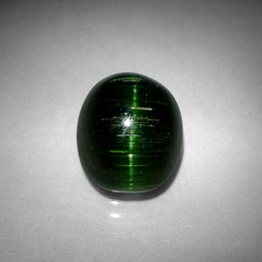 Cat's eye tourmaline verde natural 4,67ct, corte oval, opaco