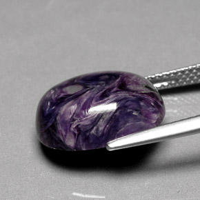 Charoíta violeta natural 7,30ct, corte oval, opaco