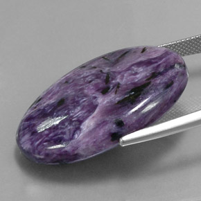 Charoíta violeta natural 37,70ct, corte oval, opaco
