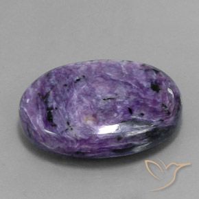 Charoíta violeta natural 34,07ct, corte oval, opaco