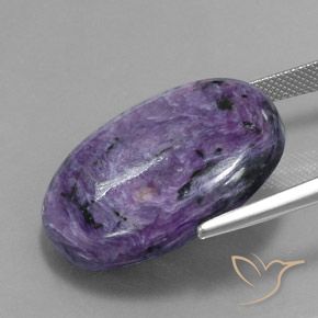 Charoíta violeta natural 34,07ct, corte oval, opaco