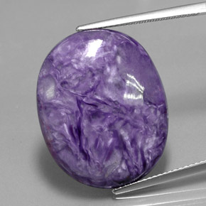 Charoíta violeta natural 26,05ct, corte oval, opaco