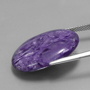 Charoíta violeta natural 26,05ct, corte oval, opaco