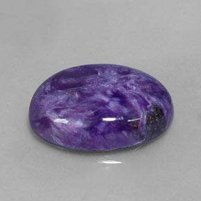 Charoíta violeta natural 9,60ct, corte oval, opaco