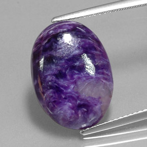 Charoíta violeta natural 8,41ct, corte oval, opaco
