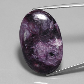 Charoíta violeta natural 40,63ct, corte oval, opaco