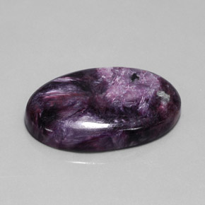 Charoíta violeta natural 40,63ct, corte oval, opaco