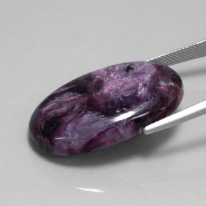 Charoíta violeta natural 40,63ct, corte oval, opaco