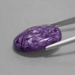 Charoíta violeta natural 16,35ct, corte oval, opaco