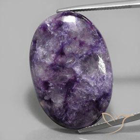 Charoíta violeta natural 33,89ct, corte oval, opaco