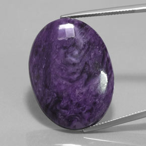 Charoíta violeta natural 28,06ct, corte oval, opaco